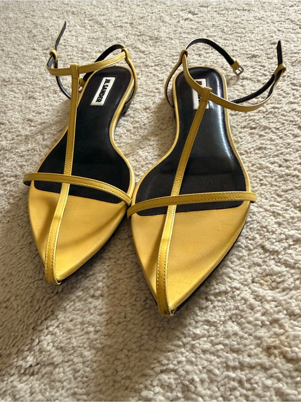 Pale yellow Jil Sander cage sandals